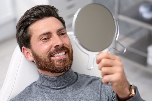 Implant Dentist: The First Steps To Take After Damaging A Dental Implant